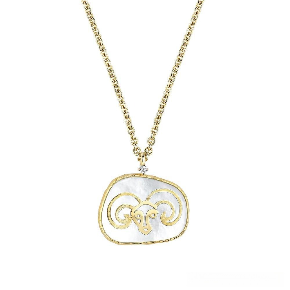 Astro Dior Aries zodiac pendant featuring gold and mother-of-pearl design representing the fiery spirit of Aries