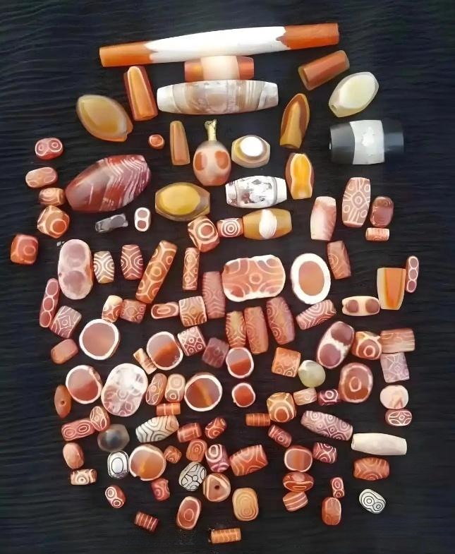 Etched beads in various shapes and patterns, once highly valued as a "hard currency" in ancient trade, sought after and rare.