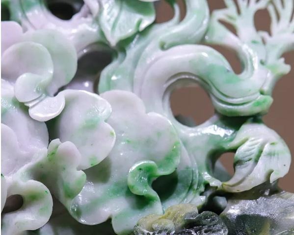 White and green Dushan Jade stone, often mistaken for Hetian Jade's 'Cuiqing' (Emerald Green) variety.