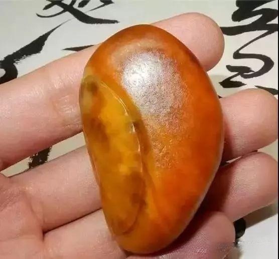 Dyed Hetian jade material, showing artificial coloring applied to low-quality jade for imitation purposes.