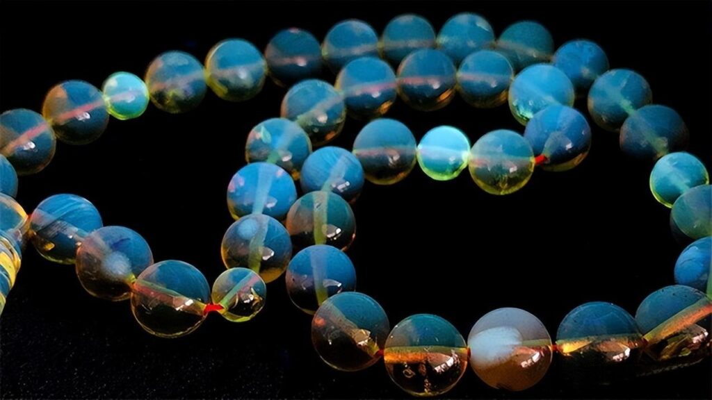 Amber bead necklace treated with internal epoxy resin filling to enhance durability and appearance.