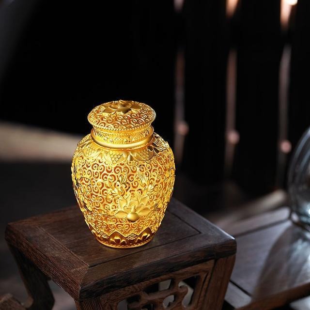 Gu Fa engraved goldware showcasing traditional Chinese hand engraving techniques and intricate craftsmanship