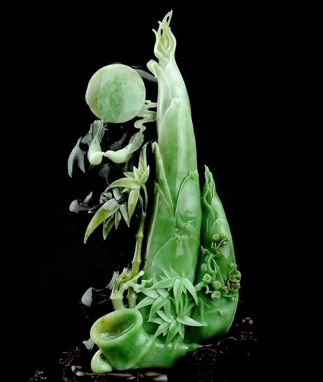 Hand-carved jade carving ornament showcasing traditional craftsmanship and fine artistic details.