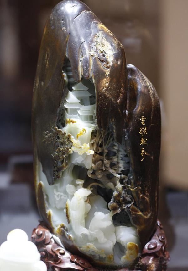 Hand-carved jade ornament showcasing the emotional warmth, natural flow, and unique individuality found in traditional jade carving types — qualities that no machine can replicate.