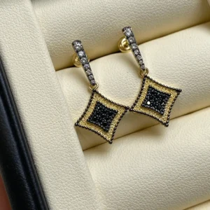 Handcrafted sterling silver earrings with cubic zirconia, perfect for office elegance.