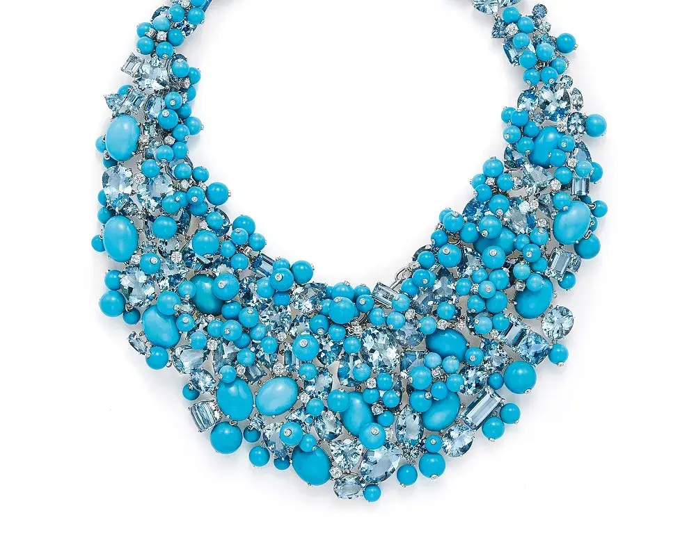 A high-quality turquoise necklace showcasing the desirable rich blue color and porcelain-like texture of a stable gemstone.