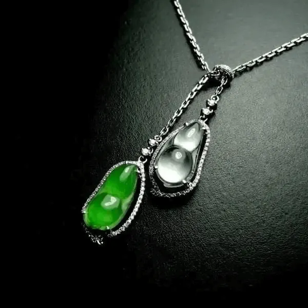 Jadeite mounted pendant showcasing translucent green jade artfully set in a delicate fine jewelry design.