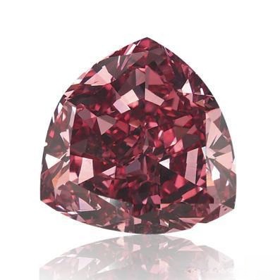 Rare Moussaieff red diamond, 5.11 carats, triangular cut, discovered in Brazil, legendary for its color and rarity
