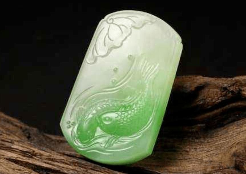 Genuine Hetian Jade 'Cuiqing' pendant featuring the characteristic vibrant yellowish-green color.