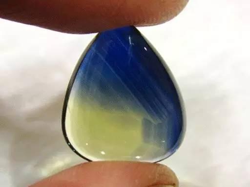 A pear-shaped Chang Le Sapphire showing the natural coexistence of both blue and yellow sapphire within one stone.