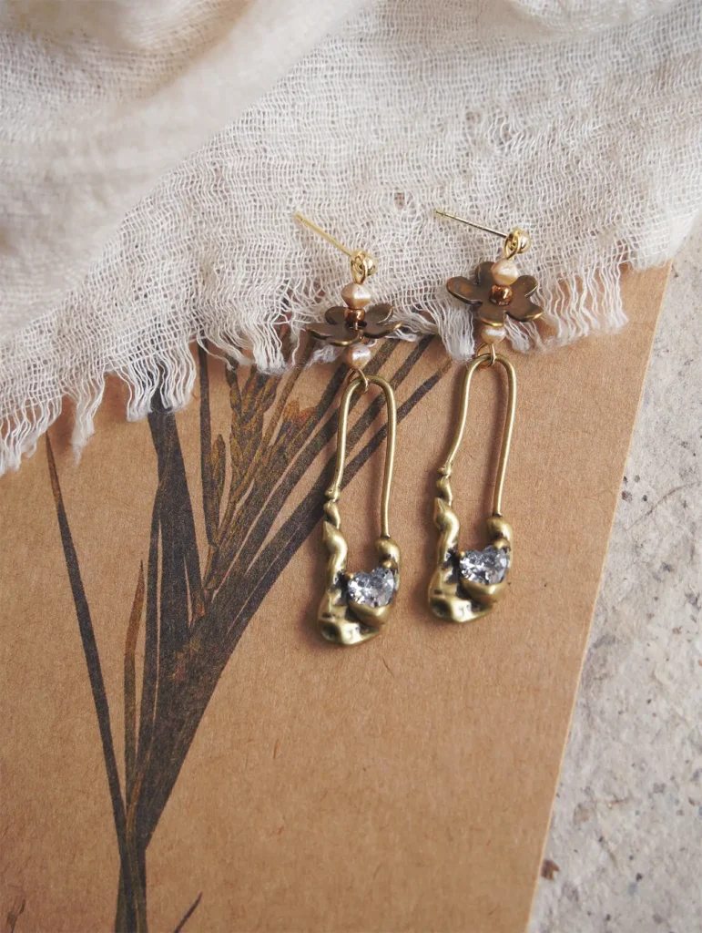 Peonyjewels handcrafted antique brass earrings styled for casual daytime wear.