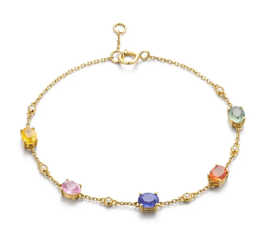PeonyJewels custom-colored gemstone gold bracelet, set with diamonds, showcasing vibrant gems and elegant design.