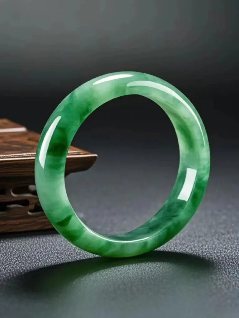 Peonyjewels natural quartz bangle featuring unique green inclusions and a smooth polished finish.