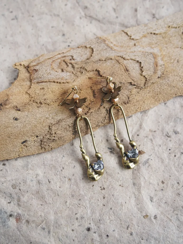 Abstract vintage S925 gold-plated sterling silver post earrings by Peonyjewels showcased for elegant evening outfits.