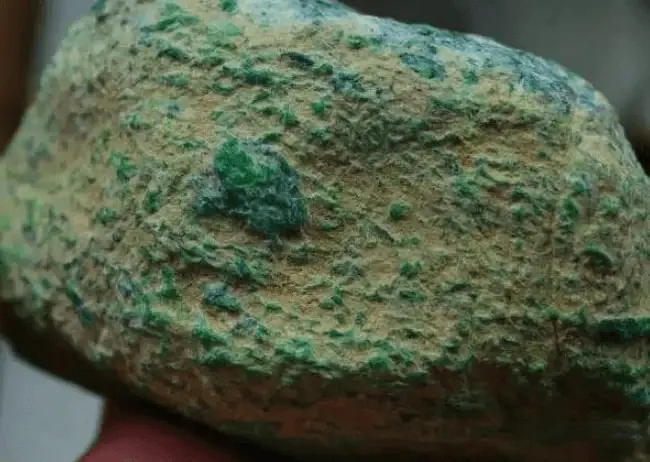 Uncut jadeite rough stone with unknown interior, high-risk purchase relying on buyer experience – Jadeite Buying Guide