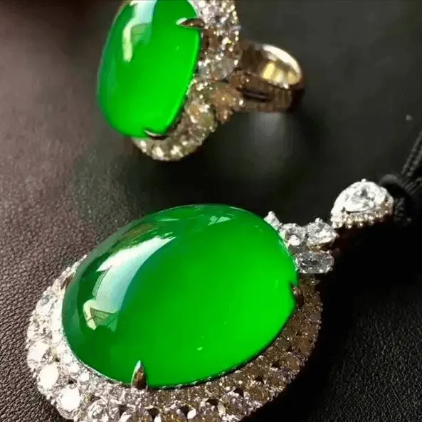 Peonyjewels jadeite ring and pendant showcasing vivid, bright, saturated, and evenly distributed green color
