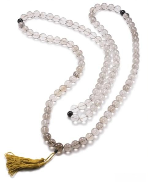 a royal 108-bead crystal prayer necklace with four dark “Buddha head” beads and a gold gourd pendant, showcasing intricate craftsmanship and imperial elegance.
