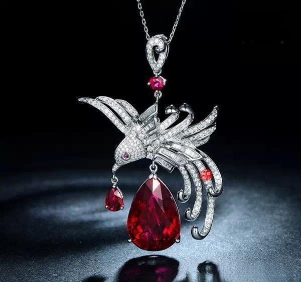 Rubellite tourmaline pendant featuring 24.2 carat main stone and 1.6 carat side stones