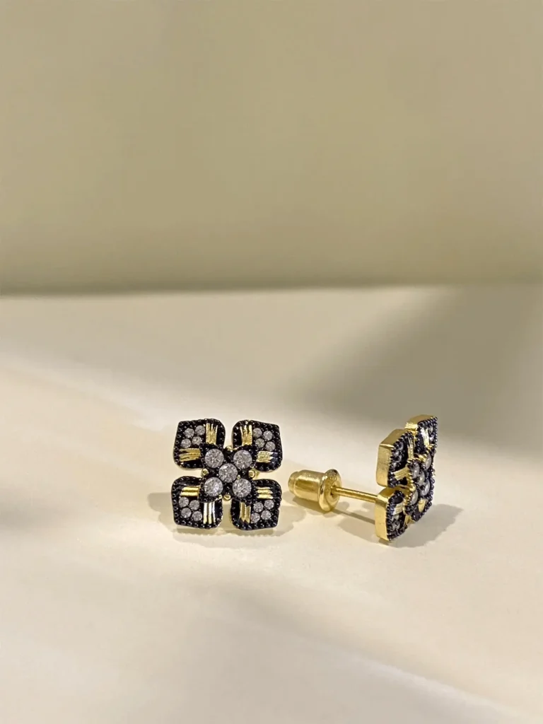 Elegant 925 sterling silver gold-plated clover stud earrings designed for refined daily wear.