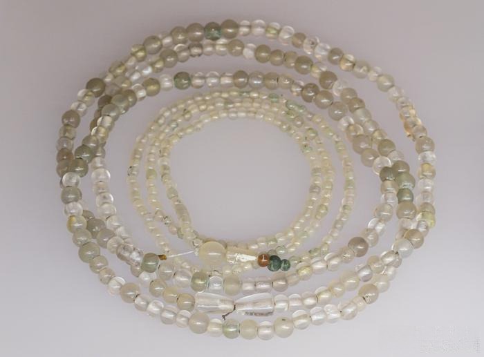 A Tang Dynasty crystal necklace from China's golden age of crystal craftsmanship, showcasing exquisite artistry and translucent beauty.