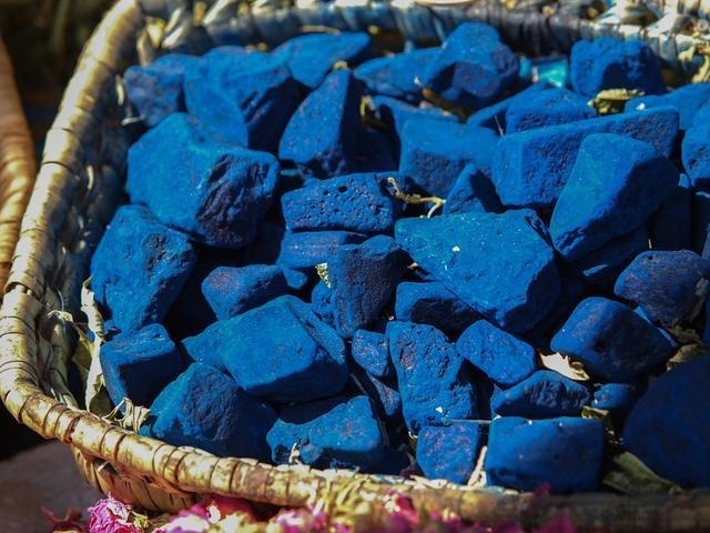 Twilight blue sapphire rough stone displaying a deep blue hue reminiscent of the sky just before sunset.