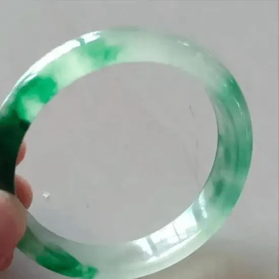 Type B+C jadeite bangle chemically treated, acid-cleaned, dyed, and polymer-filled for enhanced color and clarity – Jadeite Buying Guide