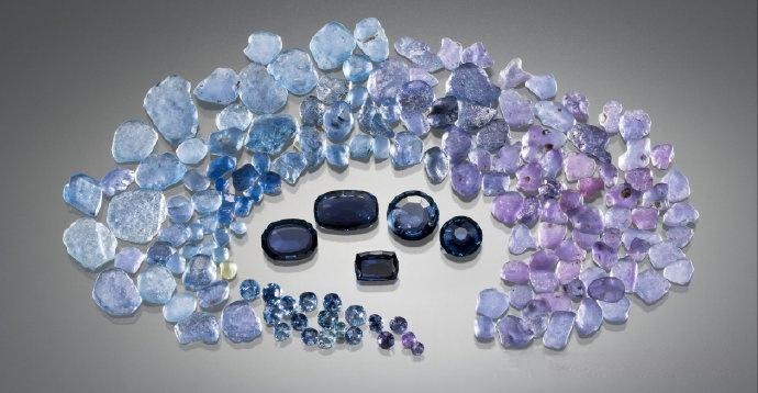 Gradient effect created by different colored Yogo sapphires, showcasing their beautiful transition from blue to purple hues.