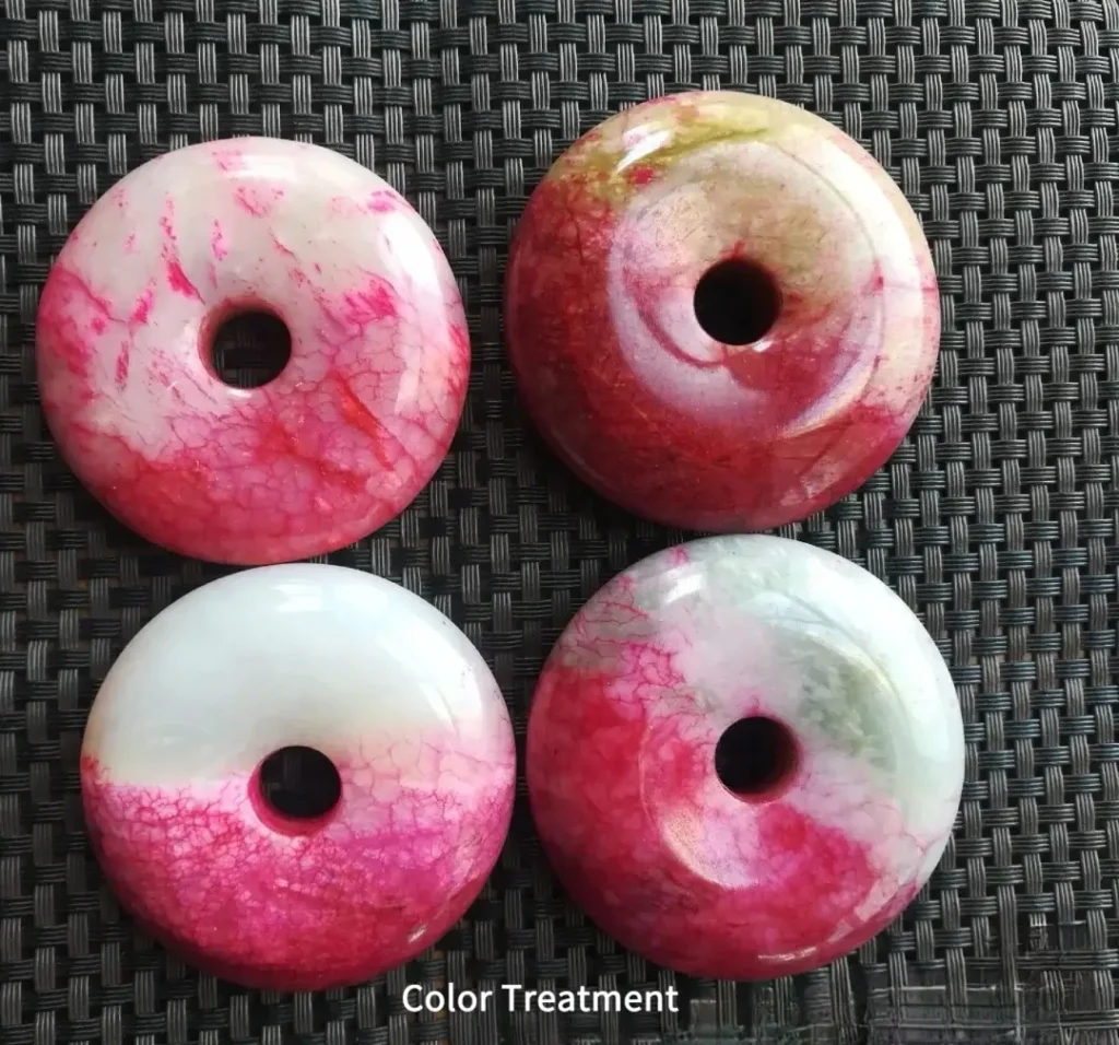 Four pendants showing clear evidence of illegal color dyeing treatment.