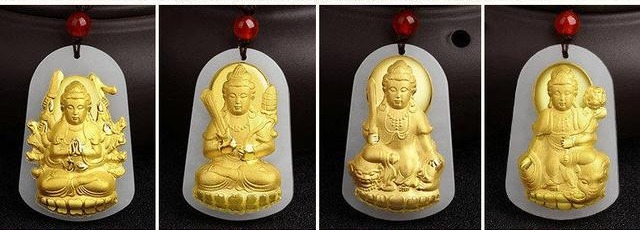 Four gold-inlaid jade Buddha pendants.