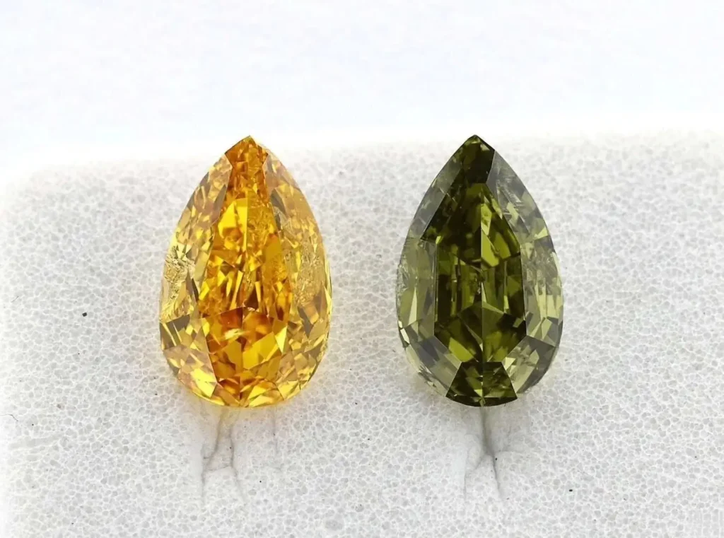 Comparison of a rare gemstone: stable grayish-green (left) and unstable orange-yellow (right) color states after thermal change.