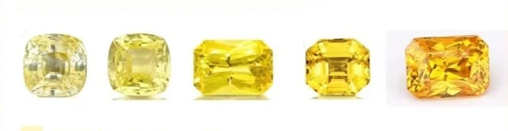 A collection of faceted yellow sapphires arranged by color intensity from pale lemon to deep golden hues.