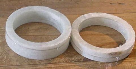 Raw, porous low-quality jadeite stone used for gemstone treatments and enhancements before acid washing.