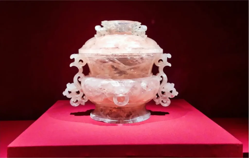 Qianlong-era rose quartz incense burner with dragon handles.