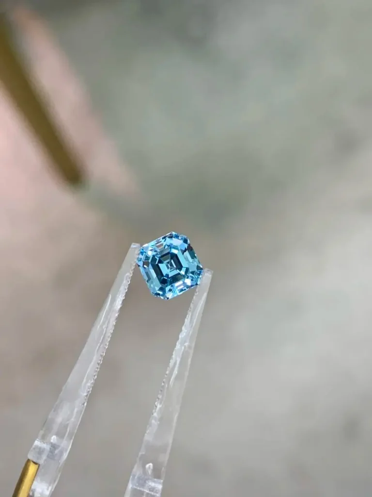 1.25ct Asscher cut Santa Maria Aquamarine with eye-clean clarity and master-grade precision faceting.