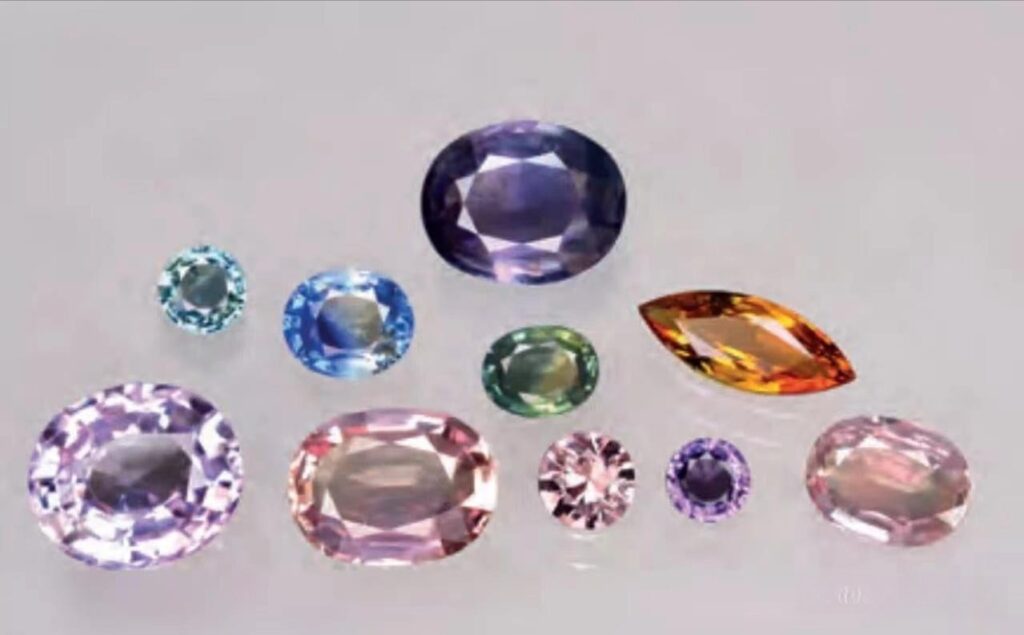 Vivid blue and multi-colored sapphire specimens from the Bo Phloi mines, premium Thailand gemstones.