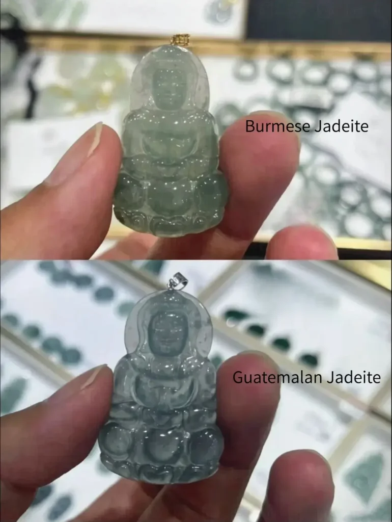 Side-by-side view of a bright green Burmese jadeite Buddha and a dark forest-green Russian Buddha.