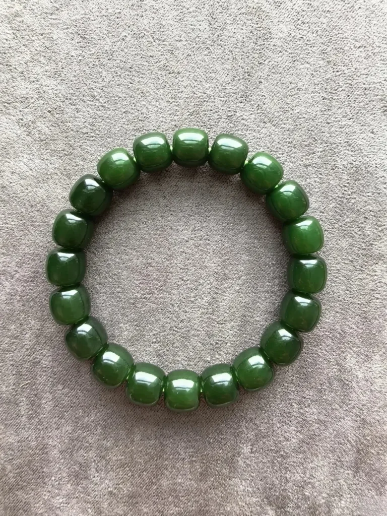 Russian nephrite jade beaded bracelet in spinach green from the legendary Mine No. 7.