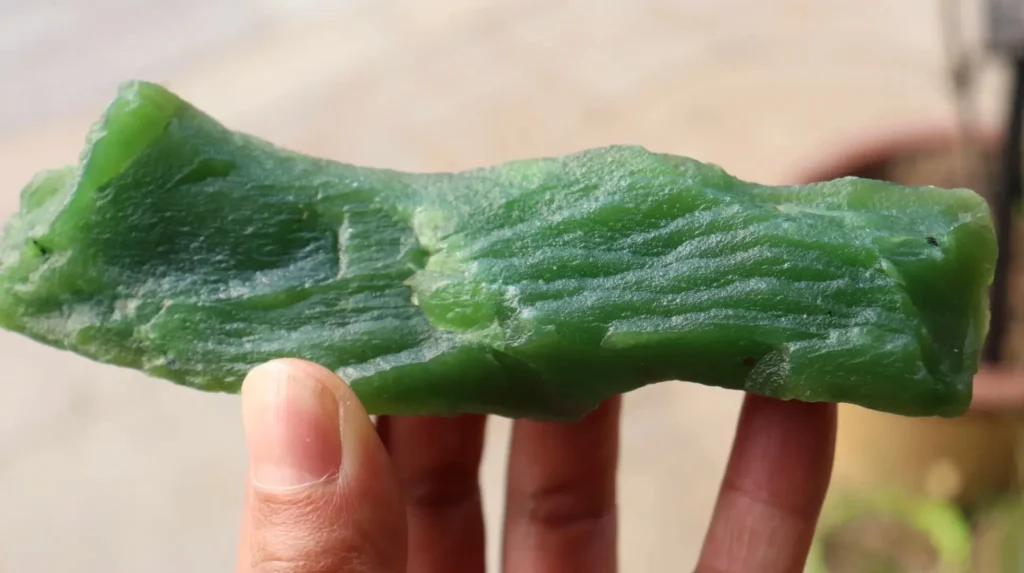 Mine 9 Russian nephrite jade with icy transparency and signature "popcorn" mineral clusters.