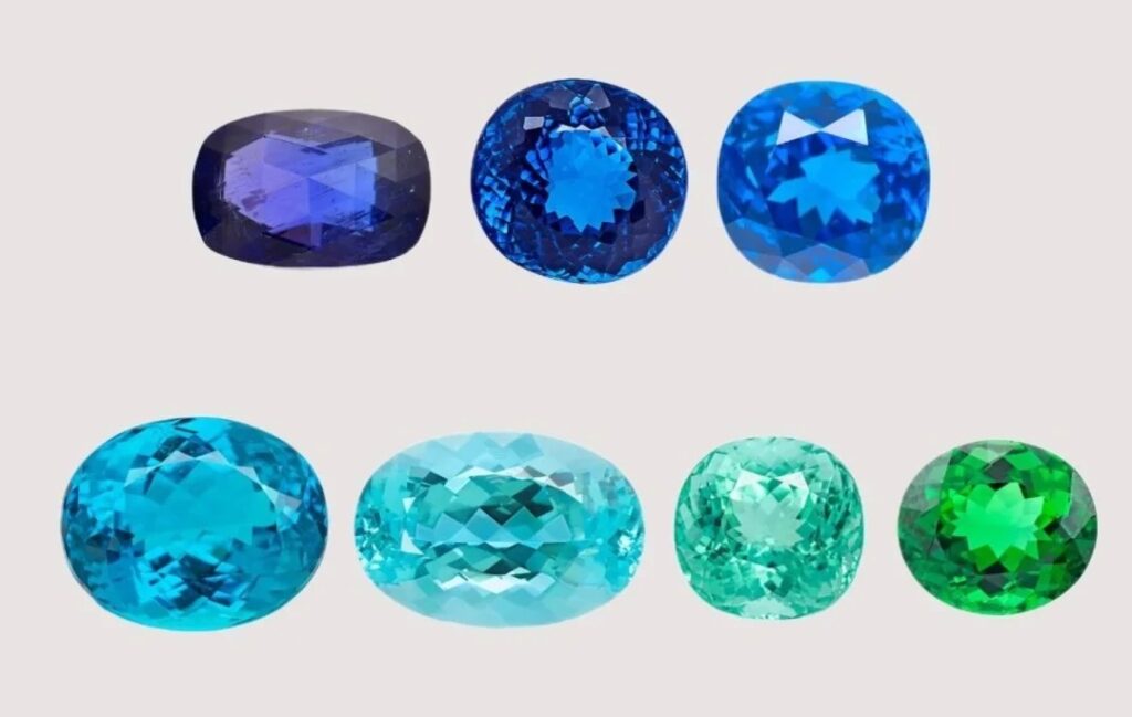 Copper-bearing gems color range chart showing vivid electric blue, neon blue-green, bright bluish green, and vibrant green.