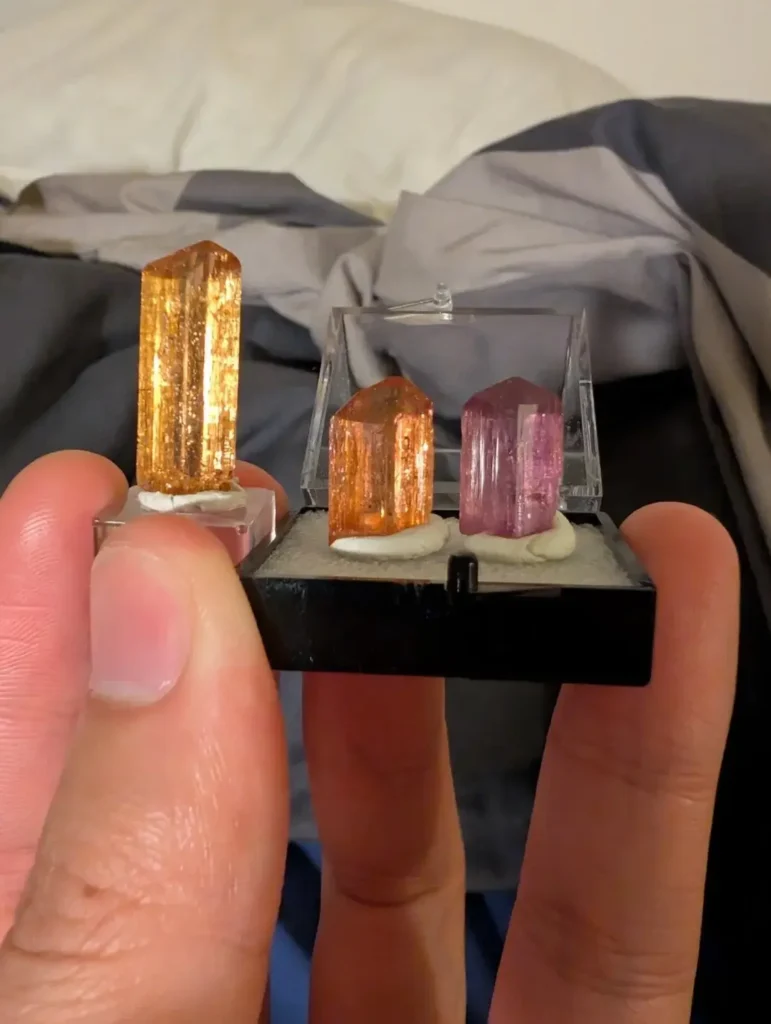 Curated personal collection featuring rare golden, orange, and sherry-toned faceted gemstones.