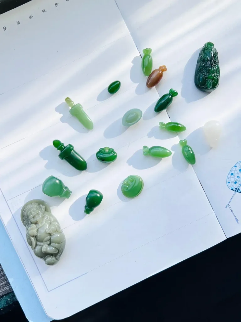 Small Russian nephrite jade carving, showing smooth texture, vivid green color, and fine craftsmanship.