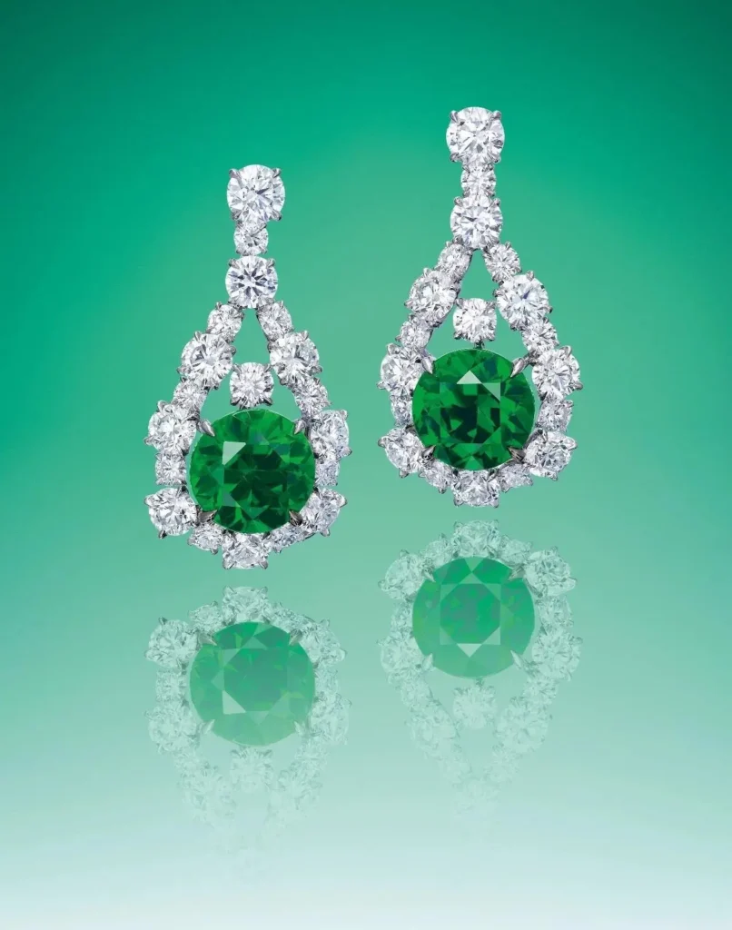 Russian Tsavorite garnet earrings, a Russian gemstone, featured in Christie's auction, showing vivid green color and brilliance.